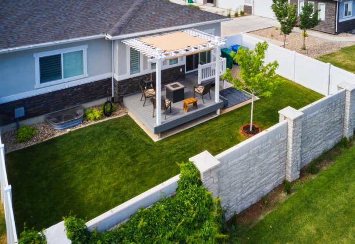Outdoor patio area with fence, part of Combo Deck backyard design in Annapolis, MD