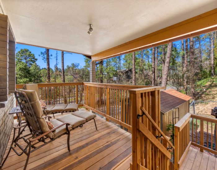 Outdoor porch in Annapolis, MD, showcasing a deck with chairs arranged for relaxation.